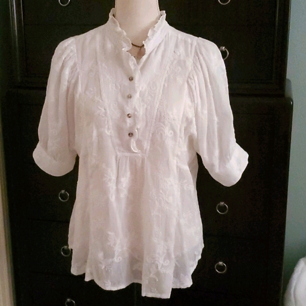 Adorable white feminine blouse from Anthropologie